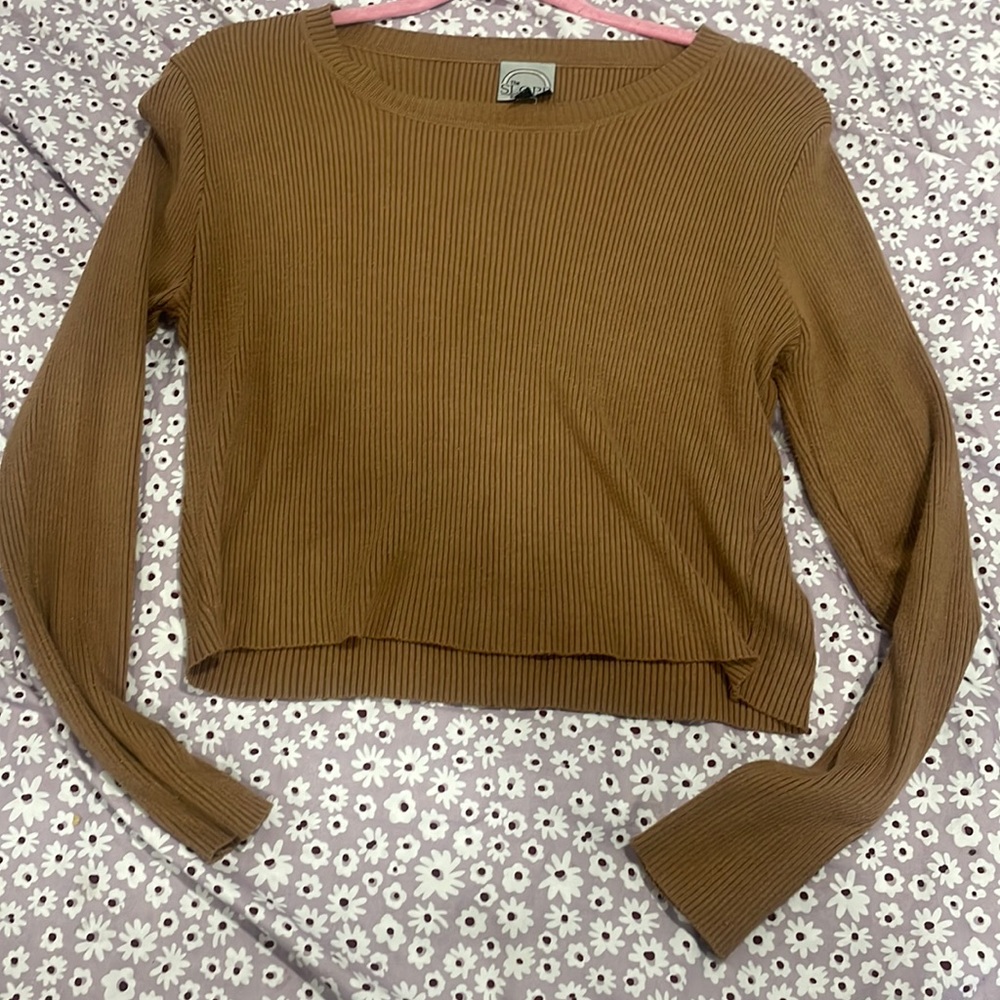 Brown sweater.
